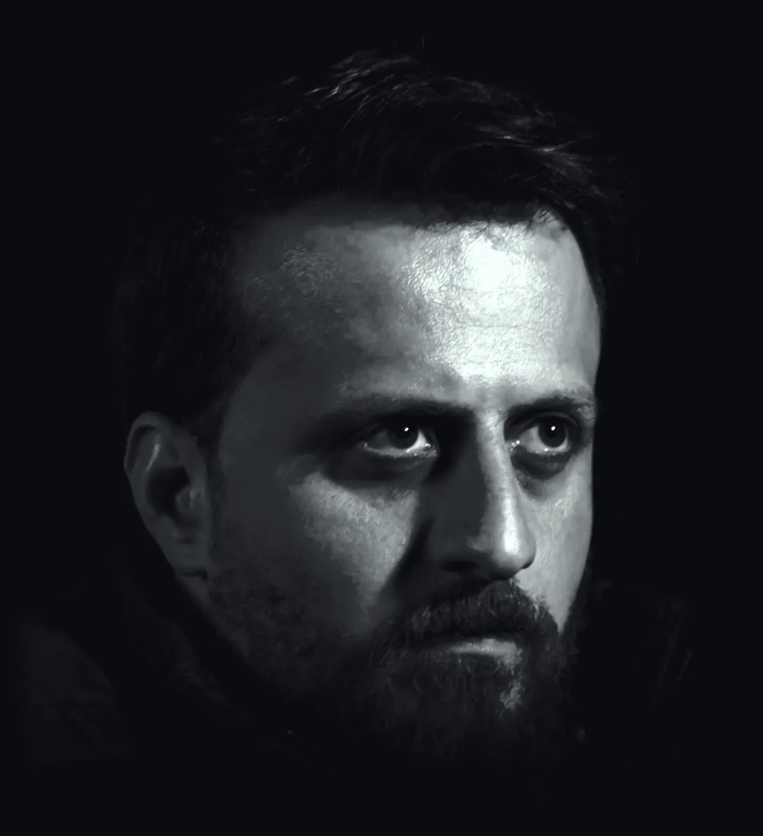 Mohamad Hasan Kadro, founder of MK Design, black-and-white portrait